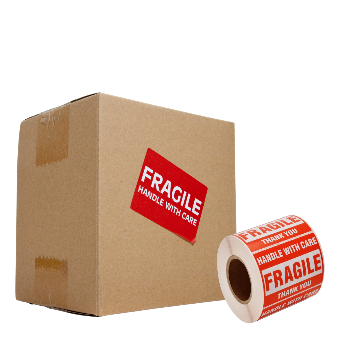 A roll of red and white FRAGILE labels next to a brown cardboard box with a matching FRAGILE label on the side.
